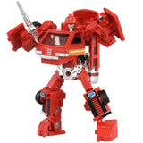 Hasbro Transformers missing link C-14 Ironhide USA red robot action figure toy accessories stock photo