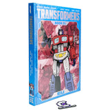 Image Comics Skybound Transformers deluxe book 01 hard cover collected issues 1-12 daniel Warren johnson optimus prime cover comic book front angle photo