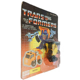 The Transformers Huffer G1 minicar lynsa peru yellow blue box package front angle unpunched card