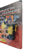 The Transformers Huffer G1 minicar lynsa peru yellow blue box package front unpunched card left partial