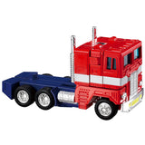 Transformers Missing Link C-02 Optimus Prime Anime Edition Hasbro USA red semi truck toy side angle